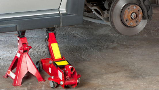 Garage setup showing Jack Stand supporting a vehicle safely